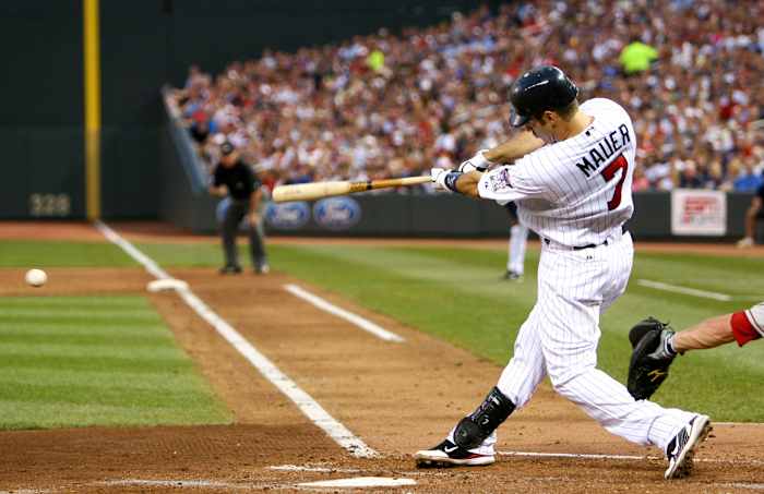 Twins catcher Joe Mauer bats against the Angels at Target Field on August 22, 2010. The Twins defeated the Angels 4-0.